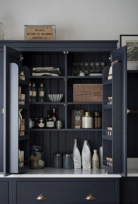 Trend forecasters say Joanna Gaines' 'brave' kitchen cabinet color will dominate our homes in 2025 Joanna Gaines Kitchen Cabinets, High Kitchen Cabinets, Gaines Kitchen, Joanna Gaines Kitchen, Rustic Farmhouse Style Kitchen, Larder Cupboard, Accent Wall Paint, Spice Storage, Blue Cabinets