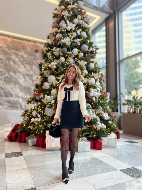 Annie Mai Thai of Stylish Petite wears a bow sweater with a tweed skirt and bow tights topped off with bow pumps for a perfect holiday look! Bow Sweater Outfit, Bow Tights, Gogo Dress, Mai Thai, Polka Dot Tights, Stylish Petite, Bow Sweater, Bow Pumps, Sweater Outfit