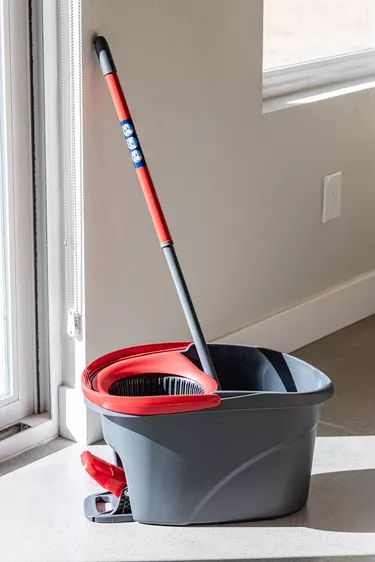 Spin Mop Cleaning Solution That Cleans Floors Like Crazy Tutorial | Hunker Best Homemade Mopping Solution, Moping Floors Cleaning, Spin Mop Cleaning Solution Diy, Spin Mop Floor Cleaner Recipe, How To Mop Floors, Floor Mopping Recipes, Mop Bucket Cleaning Solution, Best Mopping Solution For Hardwood, Best Way To Mop Floors