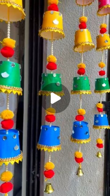 Colours Creativity Space on Instagram: "Diwali Decor DIY 10 🪔🌼 Try this diy soon👍❤️ super easy and beautiful looking 👌 Diwali garland Diwali decoration Diwali door hanging 🌼 Follow @colours_creativity_space for more 👍 🌼Material : papercups, Acrylic Colours, pompom , pearls, bell and string #diwalidecor #papercupcraft #doorhanging #diwalidiy #garland #festivaldiy #kidsactivity #schoolactivity #reuserecycle #festivaldecoration #Diwali #festivevibes #trending #craftreel" Hanging In School Decoration, Handmade Shubh Labh Ideas, Diwali Decoration At Preschool, Diwali Decorations In School, Diwali Decor Handmade, Diwali Exhibition Ideas, Diwali Related Craft, Diwali Workshop For Kids, Diwali Decoration For Preschool