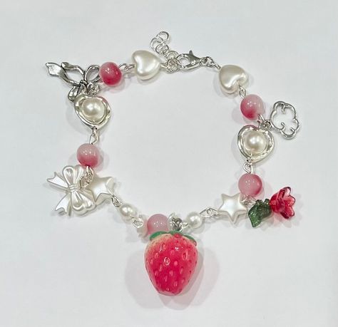 This bracelet is handmade. It is a strawberry themed bracelet with a large strawberry and rose.  2 Available Softie Jewelry, Kawaii Accessories Jewelry, Coquette Bracelet, Strawberry Accessories, Bracelet Coquette, Strawberry Coquette, Strawberry Bracelet, Strawberry Stuff, Pandora Bracelet Designs