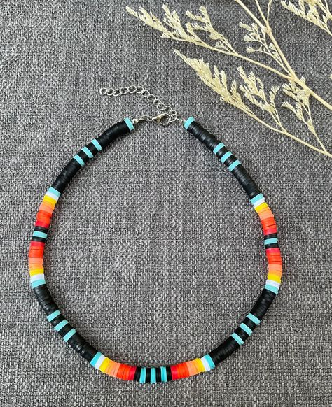 This necklace is handmade to last, with a nice colorful pattern, perfect for the summer ( or any time of the year, really)! This choker necklace gives bohemian-style vibes to your look. Each boho-style necklace was created with 6mm clay polymer discs, stainless steel-look lobster clasp, and 2 inch extender chain. I'm offering this necklace in seven different lengths. If you are interested in a different length or colors, please message me! My business thrives on Customer Satisfaction Please do not hesitate to reach me in case there is something wrong with your purchase. I will try my best to make it right for you. Thank you for shopping JGBestBeadedJewelry! Beaded Surfer Necklace, Diy Clay Bead Necklace, Polymer Clay Beads Ideas, Clay Bead Necklace Ideas, Clay Necklace Ideas, Polymer Necklace, Necklace Clay, Summer Choker, Clay Bead Necklace