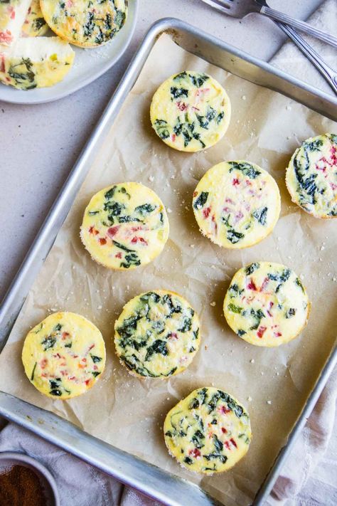 The perfect copycat Starbucks egg white bites recipe! With roasted red peppers and sauteed spinach, these baked egg bites are high in protein and packed with flavor. Light and fluffy, just like traditional sous-vide egg bites, but made in the oven, you will love this nutritious start to your day! Copycat Starbucks Egg White Red Pepper, Starbucks Egg White Bites Recipe, Baked Egg Bites, Egg White Bites Recipe, Copycat Starbucks Egg Bites, Starbucks Egg White Bites, Starbucks Egg Bites Recipe, Egg White Bites, Egg White Muffins