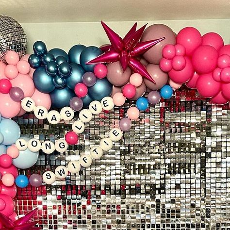 Balloon Bash Design on Instagram: ""So make the friendship bracelets" 🫶 🪩 ✨  This Taylor Swift Eras inspired install was so fun! Perfect for a birthday celebration or night in with your besties! Dm or inquire in our bio so we can make your next event extra fabulous! #palmdale #lancasterevents #lancaster #quartzhill #partyrentals #balloondecor #ballooninstallation #balloonartist #balloonstylist #taylorswiftballoons #taylorswiftparty #backdrop #shimmerwall #partyrentals" Taylor Swift Backdrop Ideas, Friendship Bracelet Balloons, Eras Tour Backdrop, Taylor Swift Birthday Backdrop, Taylor Swift Photo Backdrop, Taylor Swift Balloon Garland, Taylor Swift Backdrop, Taylor Swift Balloons, Taylor Swift Graduation Party