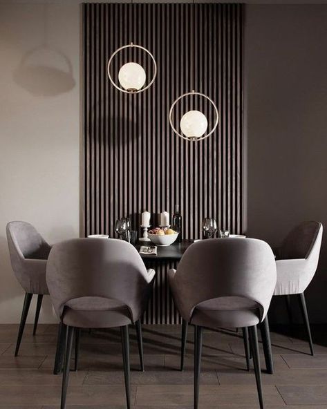 a chic contemporary taupe dining room with a dark wooden slats on the wall, a black table, grey chairs and catchy pendant lamps Taupe Dining Room, Farm House Dining Room, Mid Century Dining Room, Chic Dining Room, Vintage Dining Table, Vintage Dining Room, Mid Century Dining, Interior Wall Design, Mid Century Modern Decor