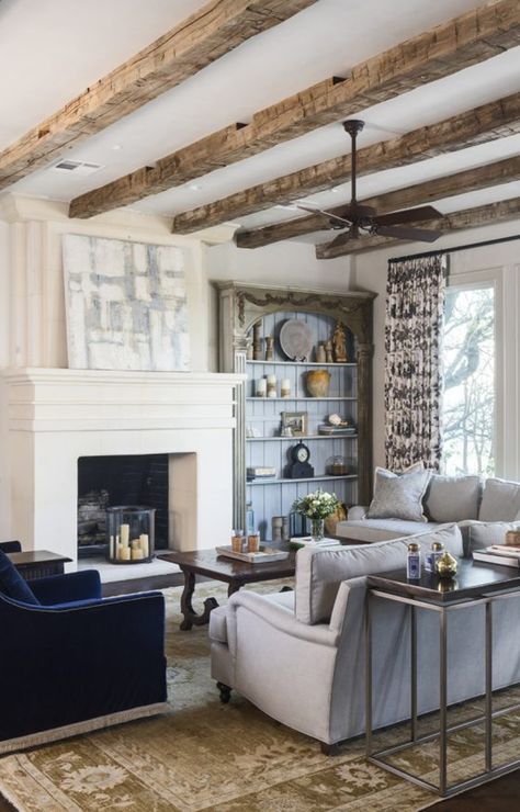 These beautiful Hand Hewn beams were sawn on one side in order to provide a flat surface to mount. The beams offer some rustic charm to this traditional home.  | #handhewnbeams #barnbeams #ceilingbeams #barnwood #rusticdecor #farmhousebeams #handhewn #rusticbaems #woodbeams Ceiling Beams Living Room, Flat Ceiling, Beams Living Room, Hand Hewn Beams, Reclaimed Wood Beams, Wood Beam Ceiling, White Oak Floors, Flooring Trends, Beautiful Home Designs