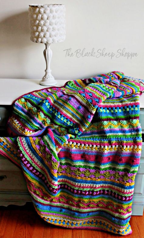 The cheerful colors in the crocheted blanket were fun to work with. Crochet Boho Blanket, Afgans Crochet, Easy Crochet Blanket Pattern, Crochet Sampler, Scrap Crochet, Crazy Crochet, Scrap Yarn Crochet, Yarn Creations, Boho Blanket