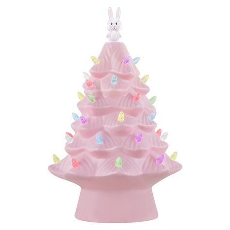 "Purchase Mr. Cottontail Pink 13\" Ceramic Easter Bunny Tree at Michaels. com. 13\" Nostalgic Easter Bunny Tree from Mr. Cottontail. Ceramic tree with pink polished finish. LED illuminated with pastel multi-colored bulbs and a Easter bunny topper. Adapter-operated with a timer. Your favorite vintage Christmas decoration just got an Easter makeover. This 13\" Nostalgic Easter Tree with LED lights by Mr. Cottontail is sure to be a new seasonal favorite with its vintage style and old-fashioned char Pastel, Tree Table Decor, Easter Tabletop Decor, Ceramic Easter, Light Up Tree, Bunny Pink, Pink Tree, Glossier Pink, Tree Table