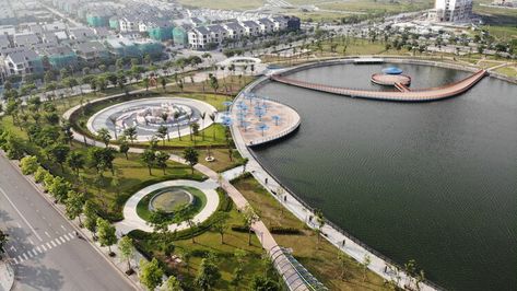 Astronomy Park is a public park project in Hanoi. The project is located in a new development area in the West of the city and is Vietnam’s first astronomy park. Construction project surrounds Bach Hop Thuy lake, an abandoned detention basin of Duong Noi urban area. This project is a boost to the real estate while also significantly improving the quality of life and public space in the new district of Hanoi. Lake Landscape Architecture, Lake Landscape Design, Waterfront Pavilion, Vietnam Architecture, Waterfront Design, Lakeside Park, Linear Park, Water Playground, Public Space Design