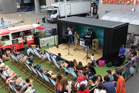 Pop-up stage at Busk the Box, Boxpark London. Hydraulically operated, the front deck opens at a press of a button. It's totally secure and pretty damn cool! Boxpark London, Box Park, Shipping Container Conversions, Festival Planning, Shipping Container Design, Container Restaurant, Sea Containers, Container Cafe, Outdoor Restaurant Design