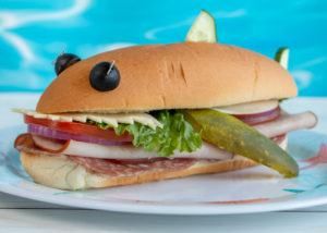 Shark Week Recipes Shark Week Dinner Ideas, Animal Sandwich, Shark Bite Drink Recipe, Shark Sandwich, Shark Week Food, Shark Submarine, Shark Themed Food, Shark Week Recipes, Shark Snacks