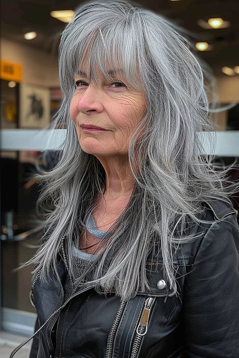 Best Haircuts with Bangs for Older Women Long Silver Hair With Bangs, Bangs With Thinning Hair, Bangs For Older Women With Long Hair And Glasses, Wolf Cut Older Women, Long Grey Hair With Bangs, Silver Hair Bangs, Shaggy Long Hair With Bangs, Silver Hair With Bangs, Gray Shag Hairstyles