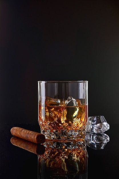 Photo whiskey with ice or brandy in glas... | Premium Photo #Freepik #photo #rum #cognac #whisky #whiskey Whiskey Still, Brandy Glass, Bear Artwork, Whiskey Glasses, Black Table, Still Life Photography, Premium Photo, Cognac, Brandy