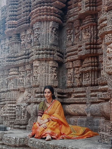 Konark temple builtify Building & Beautifying Homes FACTS ABOUT KONARK SUN TEMPLE • Konark Temple was designed in the form of a gorgeously decorated chariot mounted on 24 wheels. ⚫ constructed by king Narasimhadeva I of Eastern Ganga Dynasty around 1250 CE. ⚫ The temple is in the form of a gigantic chariot elaborately carved stone wheels, pillars and walls. • The wheels at Sun Temple Konark serve as accurate sun dials. ⚫ A heavy magnet was placed at the temple top and every two stones of Temple Women Photography, Temple Shoot Poses, Temple Saree Photoshoot, Temple Saree Look, Poses In Temple Indian, Photo Poses In Temple, Konark Sun Temple Photography, Ganga Ghat Photography, Temple Poses For Women