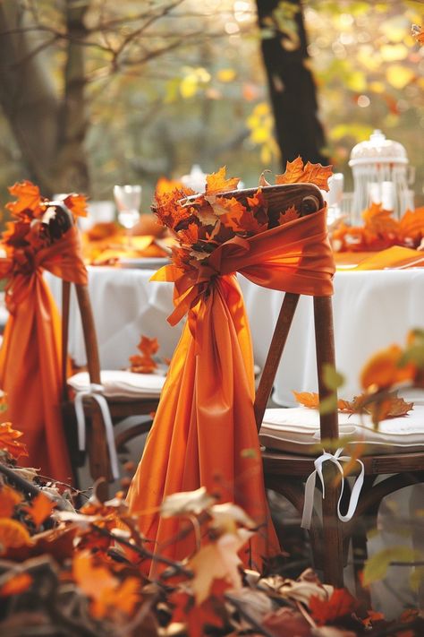 Discover how to bring autumn's embrace to your wedding with cozy chair covers and sashes. Let the essence of fall enhance your tables with leaves and harvest beauty 🍂✨. #AutumnWedding #WeddingDecor #FallLeaves #HarvestTheme #ChairSashes #WeddingIdeas #CozyDecor #SeasonalWedding Autumn Themed Wedding Decorations, Fall Chair Covers, Autumn Wedding Isles Decoration, Fall Wedding Chair Decor, Fall Leaves Wedding Decor, Fall Reception Ideas, End Of Aisle Wedding Decor, Pumpkin Themed Wedding, Fall Wedding Pumpkins