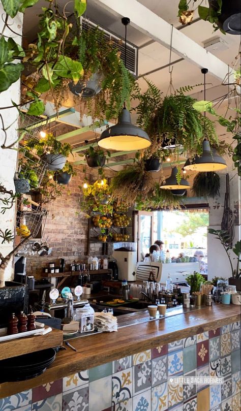 Dutch Cafe Interiors, Cottagecore Coffee Shop Aesthetic, Cafes With Plants, Green Coffee Shop Interiors, Coffee Shop With Plants Interior Design, Inside Cafe Aesthetic, Bakery With Plants, Plant Coffee Shop Aesthetic, Cute Bar Aesthetic