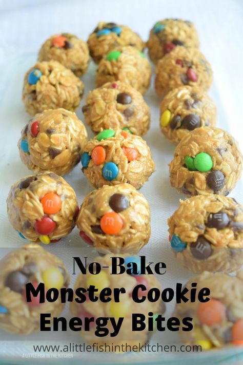 These No-Bake Monster Cookie Energy Bites are easy to make, and they are a reasonably healthy treat to share with friends and family! Use seasonal candy-coated chocolates and these can be a festive addition to any holiday table with joyful pops of color. These are a little bit addictive, so just remember to share! #nobake #nobakedesserts #nobakecookies #energybites #kidfriendly #kidfriendlysnacks #snacks #snacksfortheroad #summerrecipes #afterschoolsnacks #lunchtime #lunchboxrecipes Monster Energy Bites, Energy Bites Recipe, Road Snacks, Bake Sweets, Amazing Food Recipes, Energy Bites Recipes, Monster Cookie, Peanut Butter Roll, Chocolate Candies