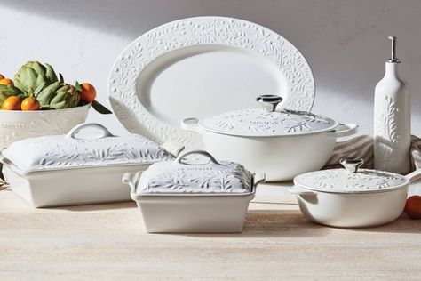 So what if you’re planning to spend this summer catching up with friends and family stateside? You can still bring a touch of Europe to your tablescape with Le Creuset’s stunning new Olive Branch Collection. Inspired by the French countryside, the collection includes pieces that are embossed with a delicate olive branch motif and finished in a soft matte texture to emulate the sun-drenched fields of Provence. Le Creuset Olive Branch Collection, Le Creuset Olive Branch, Le Crueset Pots Aesthetic, Le Creuset Collection, Le Crueset Pots, Kitchen Dishes Sets, Le Creuset Aesthetic, Le Creuset Olive, Le Creuset White