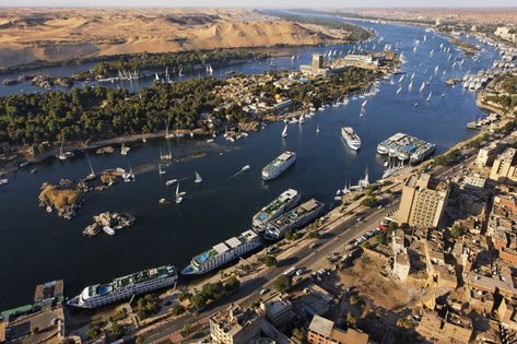 an aerial view of boats in the water