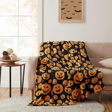 What's Included: (1) Throw Blanket Throw Dimensions: 50 in. Wide x 70 in. Long Fabric Content: 100% Premium Fleece Features: Oversized, Ultra Soft & Plush Style: Autumn & Halloween Care Instructions: Machine Wash Cold, Do Not Bleach, Tumble Dry Low Halloween Throw Blanket, Labu Halloween, Black Pumpkin, Plush Throw Blanket, Halloween Blanket, Pumpkin Face, Office Bed, Warm Throw Blanket, Bed Throw Blanket