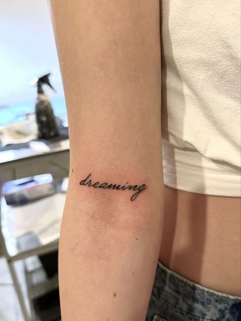 dreaming tattoo Dreaming Tattoo Word, Dream Word Tattoo, Dreaming Of You Tattoo, Keep Dreaming Tattoo, Dream Tattoos Word, Daydreaming Tattoo, Daydream Tattoo, Dreaming Tattoo, Dreamer Tattoo