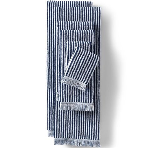 This 100% cotton towel set delivers striped delight alongside a weight substantial enough to keep you wrapped in comfort. The dimension doesn't end with the stripes though. The inch and a quarter fringe border creates an elevated look, too. Striped Towels Bathroom, Striped Delight, Navy Blue Home Decor, College App, Pirate Bathroom, Striped Bathroom, Stripe Towel, House Upgrades, Striped Bath Towels