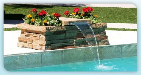 This is fun for just about any pool because it's just a small bench and planter that spouts water. Plus it's easier to accomplish yourself because the planter covers all the waterworks. Pool Waterfall Diy, Pool Waterfall Landscaping, Backyard Pool Cabana, Pool Waterfalls, Waterfall Landscaping, Swimming Pool Waterfall, Diy Waterfall, Pool Water Features, Pool Remodel