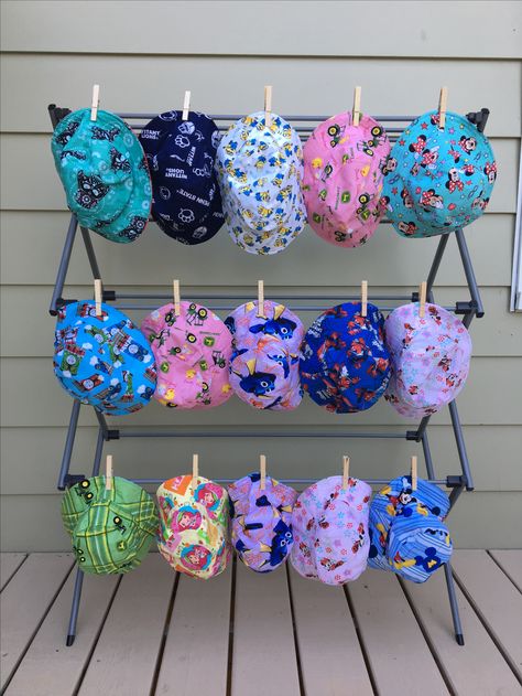 Great way to display my bucket hats at craft shows. 15 each side! #SMHstitches #buckethatready #reversiblehat #etsyshop Bucket Hat Display Ideas, How To Display Hats For Sale, Farmers Market Hat Display, Display Crochet Hats At Craft Fair, Display Hats At Craft Fair, Display Hats For Sale, Beanie Display Ideas Craft Fairs, Craft Fair Hat Display, How To Display Hats At A Craft Show