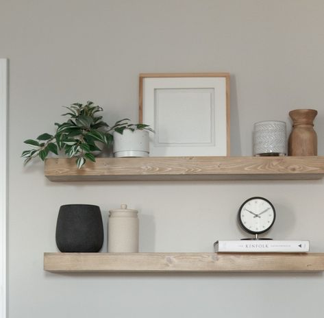 Light Wood Shelves Bedroom, Minimal Bathroom Shelf Decor, Simple Floating Shelf Decor, Neutral Bathroom Shelves, Mirror On Shelf, Beige Floating Shelves, Black And Neutral Shelf Decor, Shelf Stacking, Floating Shelf Styling