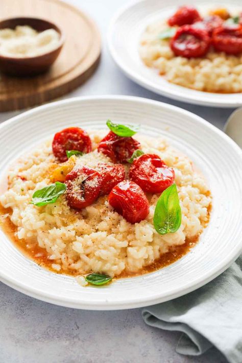 Roasted Cherry Tomato Risotto is creamy, easy to make, and perfect for a quick weeknight dinner. Zero fancy ingredients needed for this easy risotto recipe. #risotto #risottorecipe #rice #parmesan #italianrecipes #cherrytomatoes #tomatoes #weeknightdinner Tomato Risotto Recipes, Recipe Risotto, Spinach Risotto, Easy Risotto, Risotto Recipes Easy, Tomato Risotto, Risotto Recipe, Roasted Cherry, Roasted Cherry Tomatoes