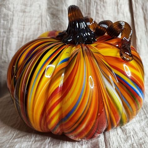 This Listing Is For A New Martha Stewart Art Glass Pumpkin. Lt Measures Approximately 5 1/2" Tall Including The Ribbon Stalk, And Approximately 22" In Circumference. The Glass Is In Perfect Condition, And The Tags Are Attached. The Pumpkin Is Free Of Chips, Cracks, Or Crazing. It Does Have Some Good Weight To It And Needs To Be Shipped Alone Due To Poshmark Weight Restrictions. This Is Made With A Recognizable Murano Flair. This Is Suitable To Display Through Thanksgiving. I Have Several Glass Pumpkins Listed In My Closet As Shown In The Last Photos. This Listing Is Only For The One Described. Buy With Confidence, Very Careful Packaging Promised. Halloween Bin Pumpkin Sculpture, Amy Brown Art, Glass Eggs, Art Glass Pumpkin, Decorative Pumpkins, Amy Brown, Glass Creations, Striped Art, Glass Art Projects