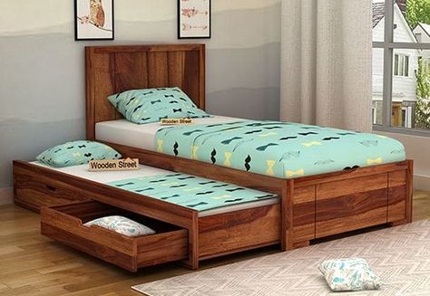 Gary Kids Trundle Bed With Storage happens to be an amazing bedstead for #kidsbedroom due to its brilliant features. First one is that it's a #trundlebed which is an obvious yes for kids then its a #bedwithstorage in form of 2 drawers beneath so adds to convenience. #shoponline this wooden trundle bed for kids at #woodenstreet Modern Trundle Bed, Kids Trundle Bed, Wooden Trundle Bed, Trundle Bed Kids, Wooden Bed With Storage, Beds With Storage, Bed Designs With Storage, Trundle Bed With Storage, Double Bed With Storage