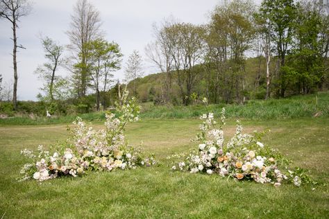 Ground Arch Ceremony, Altar Ground Flowers, Open Field Ceremony, Ground Installation Wedding Ceremony, No Arch Ceremony, Wedding Altar Flowers On Ground, Wedding Arch Whimsical, Ground Altar Flowers, Ground Ceremony Florals