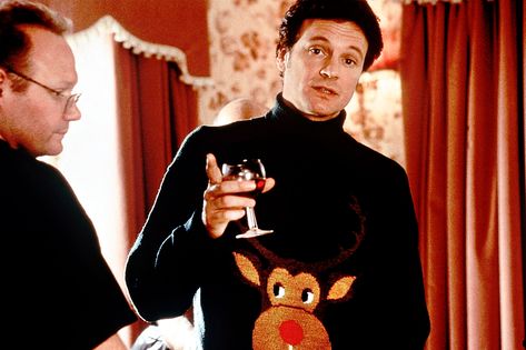 The untold story of Mr. Darcy's ugly holiday sweater in <em>Bridget Jones's Diary</em> Colin Firth Bridget Jones, Reindeer Jumper, Bridget Jones Diary, Beau Film, Matthew Goode, Ugly Holiday Sweater, Tim Roth, Renee Zellweger, Christmas Sweater Party