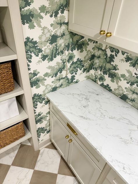 faux marble countertops and check floor for laundry room design Wallpaper Behind Shelves Laundry Room, Laundry Room Countertop Options, Marble Laundry Room, Wallpaper Countertop, Faux Marble Countertops, Check Floor, Laundry Room Counter, Laundry Room Countertop, Wal Paper