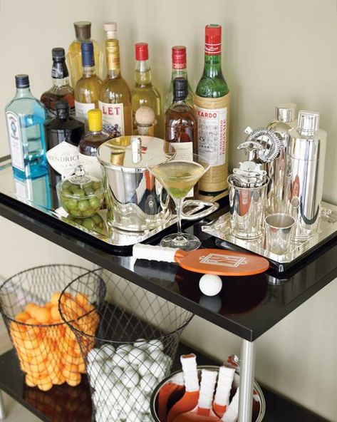 Spirits go in and out of vogue, but a well-stocked bar is timeless. To wit: this list from Martha Stewart's "Entertaining," first published in 1982! Build the home bar of your dreams with her all-inclusive -- and still perfect -- list of alcohol, mixers, and equipment. Extra Dirty Martini Recipe, Dirty Martini Recipe, Bar Cart Inspiration, Bandeja Bar, Alcohol Bar, Classic Martini, Bar Cart Styling, Bar Cart Decor, Martini Recipes