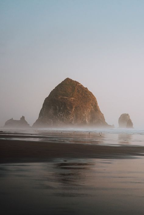 Iconic Haystack Rock in Cannon Beach, Oregon Entry Art, Pnw Vibes, Gold Beach Oregon, Haystack Rock, Travel Oregon, Walks On The Beach, Summer Board, Cannon Beach Oregon, New Wallpaper Iphone