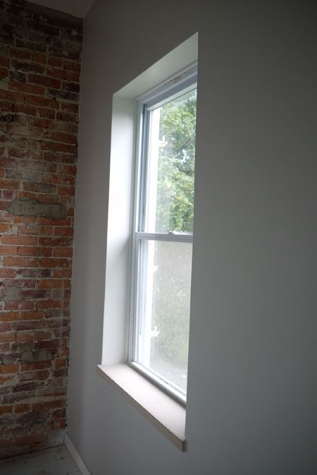 Low Profile Window Casing, Window Frame Ideas Moldings, Frameless Windows Interior, Extended Window Sill, Basement Window Trim, Modern Window Trim Interior, Window Trim Modern, Windows Without Trim, Bathroom Window Sill Ideas