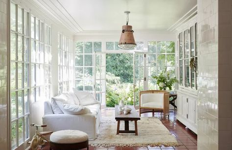 40 Sunroom Ideas To Make the Most of This Airy, Light-Flooded Bonus Space Square Sunroom, French Country Sunroom, Country Sunroom, Narrow Sunroom, Porch To Sunroom Conversion, Sunroom Entryway, Dining Sunroom, Porch To Sunroom, Cozy Sunroom