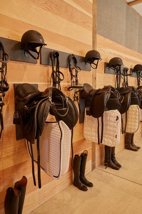 Tour a Private Dressage Facility in the Cascade Mountains - STABLE STYLE Saddle Room Ideas, Aesthetic Tack Room, Organized Tack Room, Fancy Tack Room, Tack Room Layout, Horse Stables Ideas, Barn Tack Room Ideas, Horse Barn Organization Ideas, Wood Horse Fence