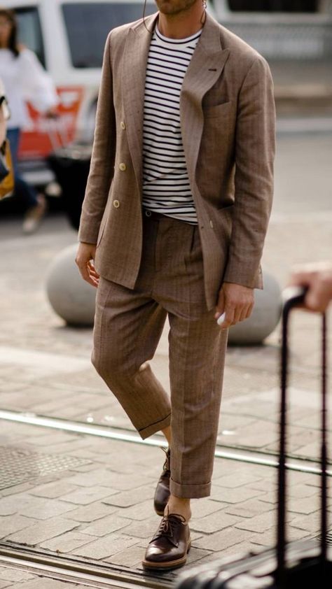 Man is wearing a brown stripe suit with cuffed pants and a striped brown and white t-shirt. Masculinity Quotes, Pitti Uomo Street Style, Custom Tailored Suits, Quotes Empowering, Man Outfit, Older Man, Modern Men, Best Dressed Man, Men With Street Style