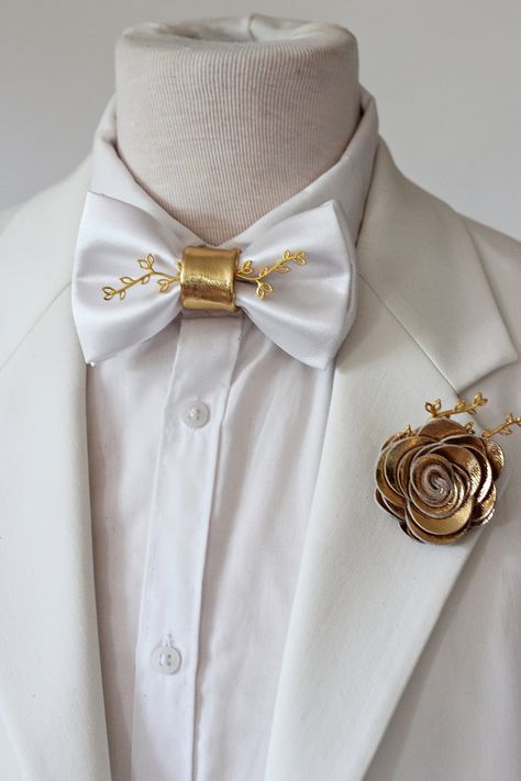 White bow tie lapel pin set, wedding, groom satin bowtie groomsmen attire, gold boutonniere rose flower, bow tie, gold Rhinestones bow tie by Nevestica on Etsy Wedding Suits Groom White And Gold, White And Gold Tuxedo Groom Suits, White Suit Gold Tie, White And Gold Suit Men Wedding, White Gold Suit Men, White And Gold Groomsmen Suits, Gold And White Groom Suit, White And Gold Wedding Suit, Gold Tie Suit