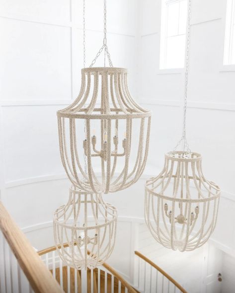 The Paloma Coco Chandelier’s large scale and timeless lantern silhouette, modernized with a handcrafted frame of natural coconut shell beads, is destined to make an unforgettable entrance. #Palecek 1. Design: @gifts_and_graces_interiors 2. Design: @amystormandco // Photography: @stofferphotographyinteriors Lantern Silhouette, Coconut Shell, Shell Beads, Paloma, Lanterns, Entrance, Coco, Shells, Coconut