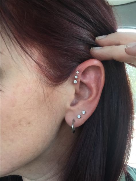 So in love with my new forward triple helix piercing! Forward Helix Piercing Triple, 3 Forward Helix Piercing, Triple Forward Helix Piercing Ideas, Triple Love Piercing, Ear Mapping, Piercing Combinations, Triple Helix Piercing, Triple Forward Helix Piercing, Ear Piercing Combinations