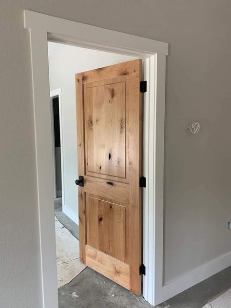 Stained Interior Doors, Wood Doors White Trim, Knotty Pine Doors, Farmhouse Interior Doors, Alder Doors, Farmhouse Trim, White Baseboards, Pine Interior Doors, Interior Door Styles