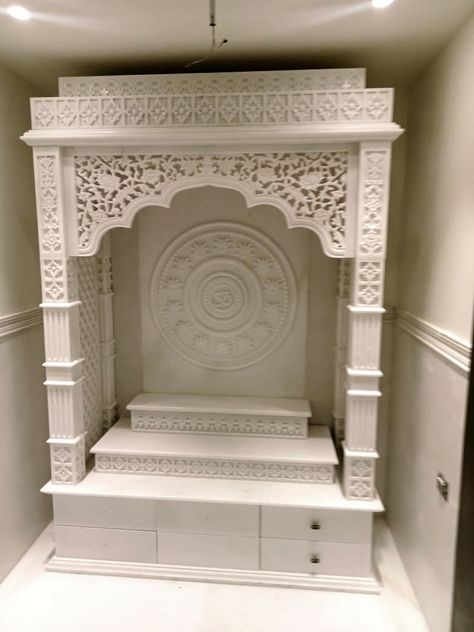 Mandir in white marble Bhagwan Mandir In Home, Marbel Mandir Home, Marble Puja Mandir, Marble Home Temple, Marbel Mandir Design, Stone Mandir Design, White Mandir For Home, White Mandir Design, Marble Mandir Design Puja Room Modern