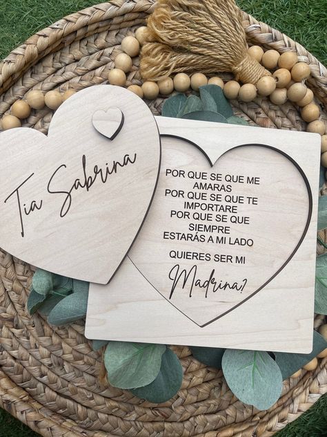 Such a cute and memorable way to make a proposal for a future madrina, padrino or both This is a laser cut and engraved heart proposal that can be kept for years to come. Made out of real maple plywood, this removable heart is the perfect gift for a godparent proposal.  Sign pictured measures 6.5x6.5 Additional size options -5x5 -8x8 Nina Proposal Ideas, How To Ask Padrinos For Bautizo, Madrina Proposal Ideas, Will You Be My Godparents Proposal, Godparents Proposal Ideas Spanish, Cute Way To Ask Someone To Be Godparents, Godparents Proposal Ideas, Padrinos Proposal Spanish, Asking People To Be Godparents