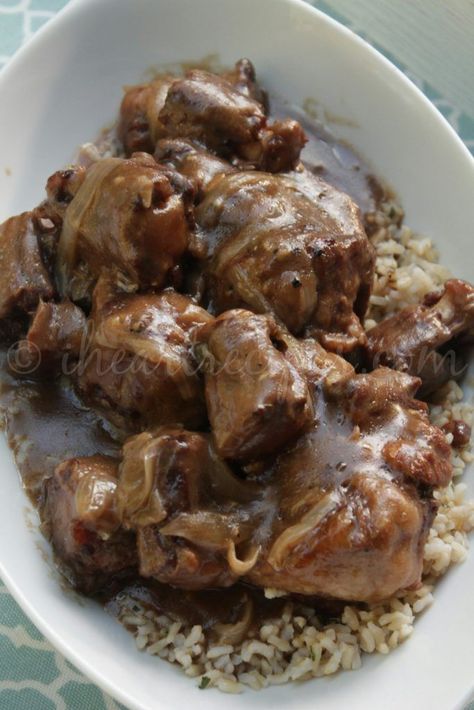 Southern, soul food style smothered oxtails. Smothered in a homemade onion and garlic gravy, and slow cooked in the Crock Pot until they are falling off the bone tender! There's something about southern oxtails and gravy that just comforts my soul. No seriously! If I'm not feeling well, or If I had a bad day just the Southern Oxtails, Smothered Oxtails, Garlic Gravy, Cooking Oxtails, Ox Tails, Oxtail Recipe, Ox Tail, I Heart Recipes, Oxtail Recipes