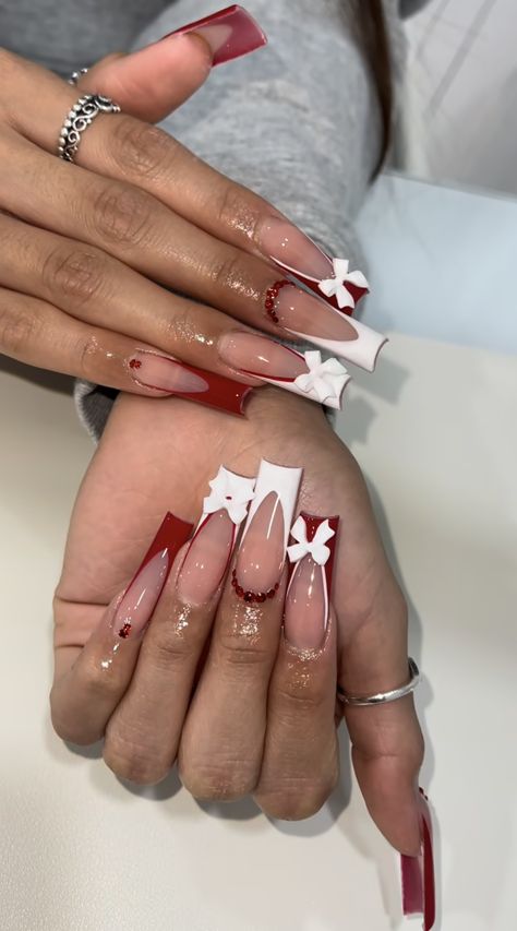 Christmas’s Nail Ideas, December Nail Inspo 2024, White And Red Acrylic Nails With Design, Ruby Acrylic Nails, Nail Inspo Red Bottoms, Red Long Nails Square, Design On French Tip Nails, Extra Long Red Nails, Red Long Nail Designs