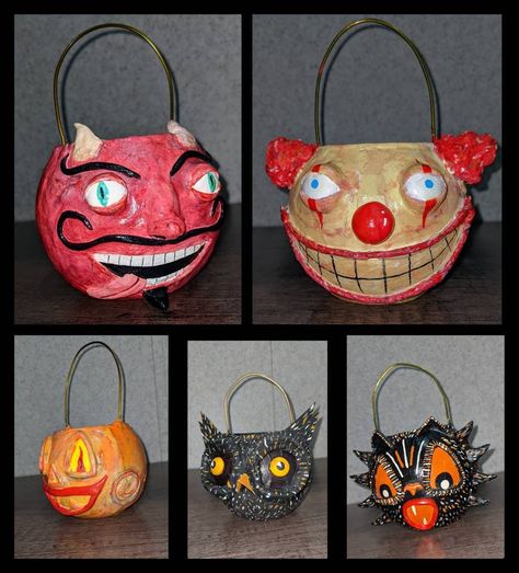 I have always loved the look of vintage paper mache trick-or-treat buckets. However, since they are so delicate there aren't many authentic ones left and those that are come at a hefty price.  So, a couple of months ago I decided to make my own! I make them Out of miniature glass fish bowls coated with paper mache. I then add facial features made of clay and other materials. Each bucket takes a minimum of 3 hours to make so I hope that explains the price!  These buckets are 4 Inches tall (with t Vintage Halloween Crafts, Trick Or Treat Bucket, Paper Mache Pumpkins, Vintage Paper Mache, Fish Bowls, Treat Bucket, Halloween Buckets, Frankenstein Halloween, Paper Mache Sculpture